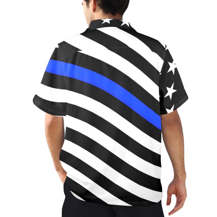 Back view of a person wearing a black and white striped button-up shirt with a horizontal blue line and white stars.