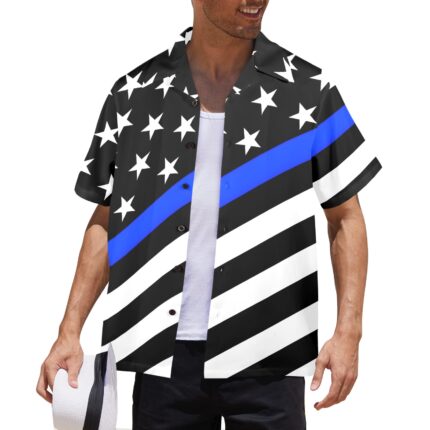 A man wearing a button-up shirt featuring a black and white American flag design with a blue stripe across the middle.