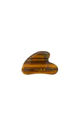 Mayella heart shaped Tiger Eye Gua Sha on white background