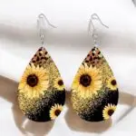 These sunflower printed earrings are a fun and stylish accessory that adds a pop of color and a touch of wild flair to any outfit. The vibrant sunflower design contrasts beautifully with the bold leopard and sparkly print, making them perfect for both casual and dressy occasions. Lightweight and easy to wear, these earrings are sure to turn heads and brighten your day!