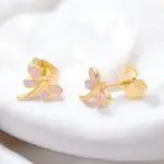 These adorable gold-plated dragonfly stud earrings are perfect for little girls who love a touch of whimsy! With their charming design and shiny finish, they add a playful sparkle to any outfit. Lightweight and comfortable, these earrings are ideal for everyday wear or special occasions, making them a delightful gift for any young fashionista.