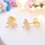 These adorable gold-plated dragonfly stud earrings are perfect for little girls who love a touch of whimsy! With their charming design and shiny finish, they add a playful sparkle to any outfit. Lightweight and comfortable, these earrings are ideal for everyday wear or special occasions, making them a delightful gift for any young fashionista.