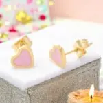 These adorable pink enamel heart stud earrings are the perfect accessory for any little girl who loves to shine. With their charming design and elegant finish, they add a touch of sweetness to any outfit. Lightweight and comfortable, these earrings are ideal for everyday wear or special occasions, making them a delightful gift for birthdays or holidays PSST Adults can wear these beauties too !!