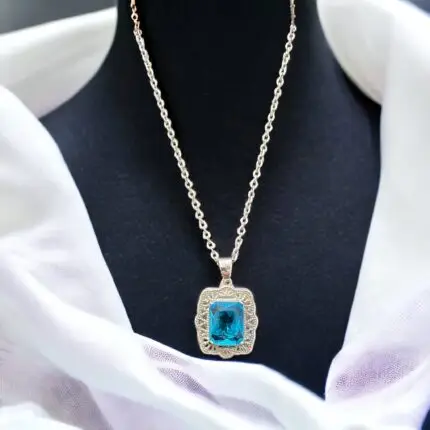 This exquisite zircon necklace features a shimmering blue sqaure stone that sparkles in the light, adding a touch of glamour to any outfit. The pendant is crafted from high-quality material, which is both durable and elegant. The stainless steel necklace measures 18 inches in length and features an adjustable chain that allows you to customize the fit. Whether you wear it to a formal event or simply to dress up a casual outfit, this zircon necklace is sure to turn heads and make a statement.