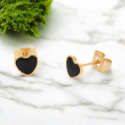 These adorable black enamel heart stud earrings are the perfect accessory for any little girl who loves to shine. With their charming design and elegant finish, they add a touch of sweetness to any outfit