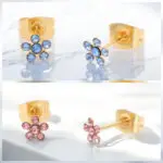 Their stunning design features delicate flower shapes adorned with sparkling blue or pink rhinestones making them the perfect accessory for any occasion