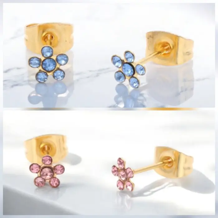 Their stunning design features delicate flower shapes adorned with sparkling blue or pink rhinestones making them the perfect accessory for any occasion